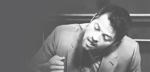 Misha Collins licking an imaginary water fountain with a delectable looking tongue