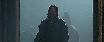 Aragorn is slowly backing out of Helm's Deep and closing the doors