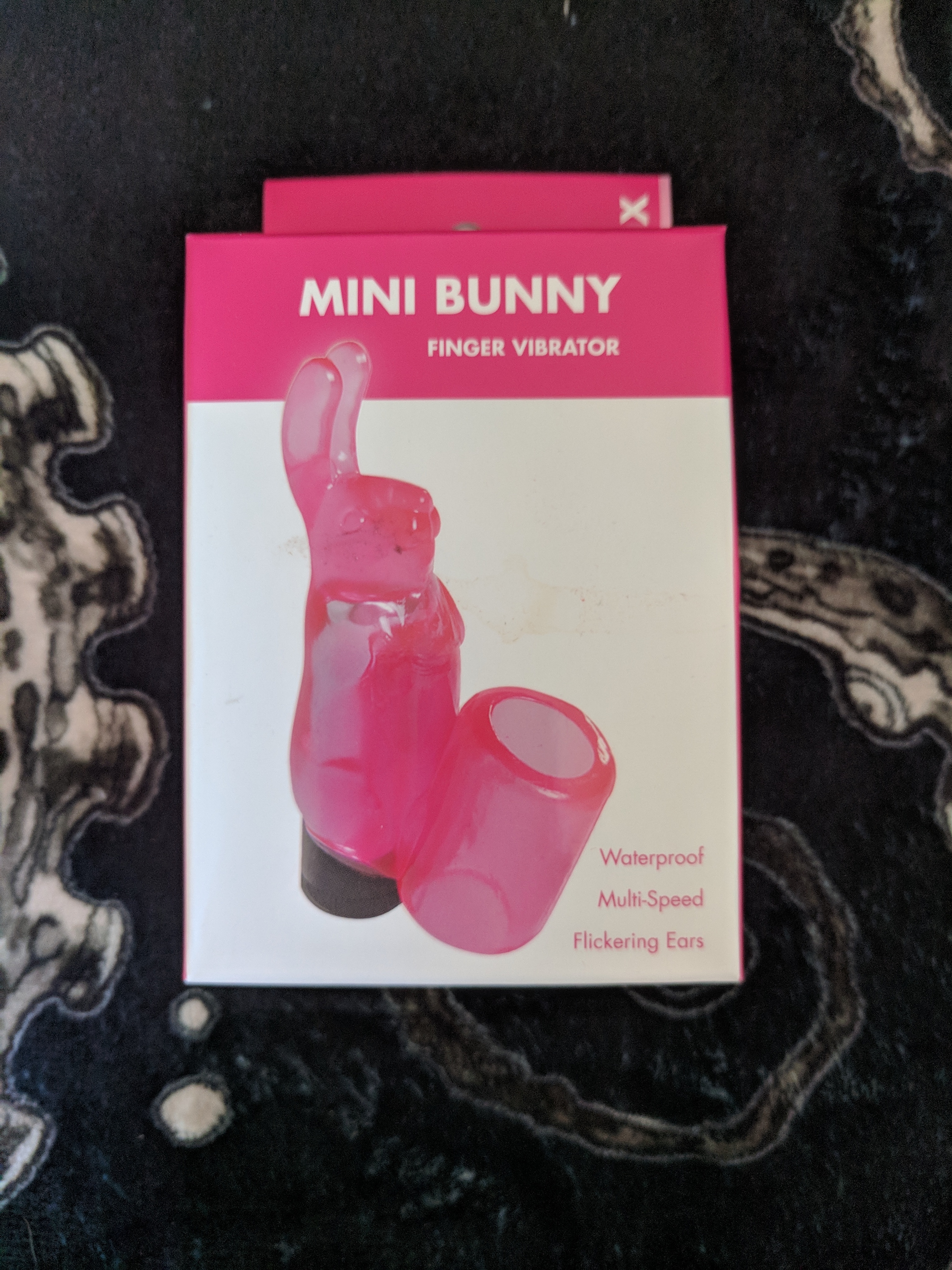 Pocket bunny vibrator external box, showing the toy