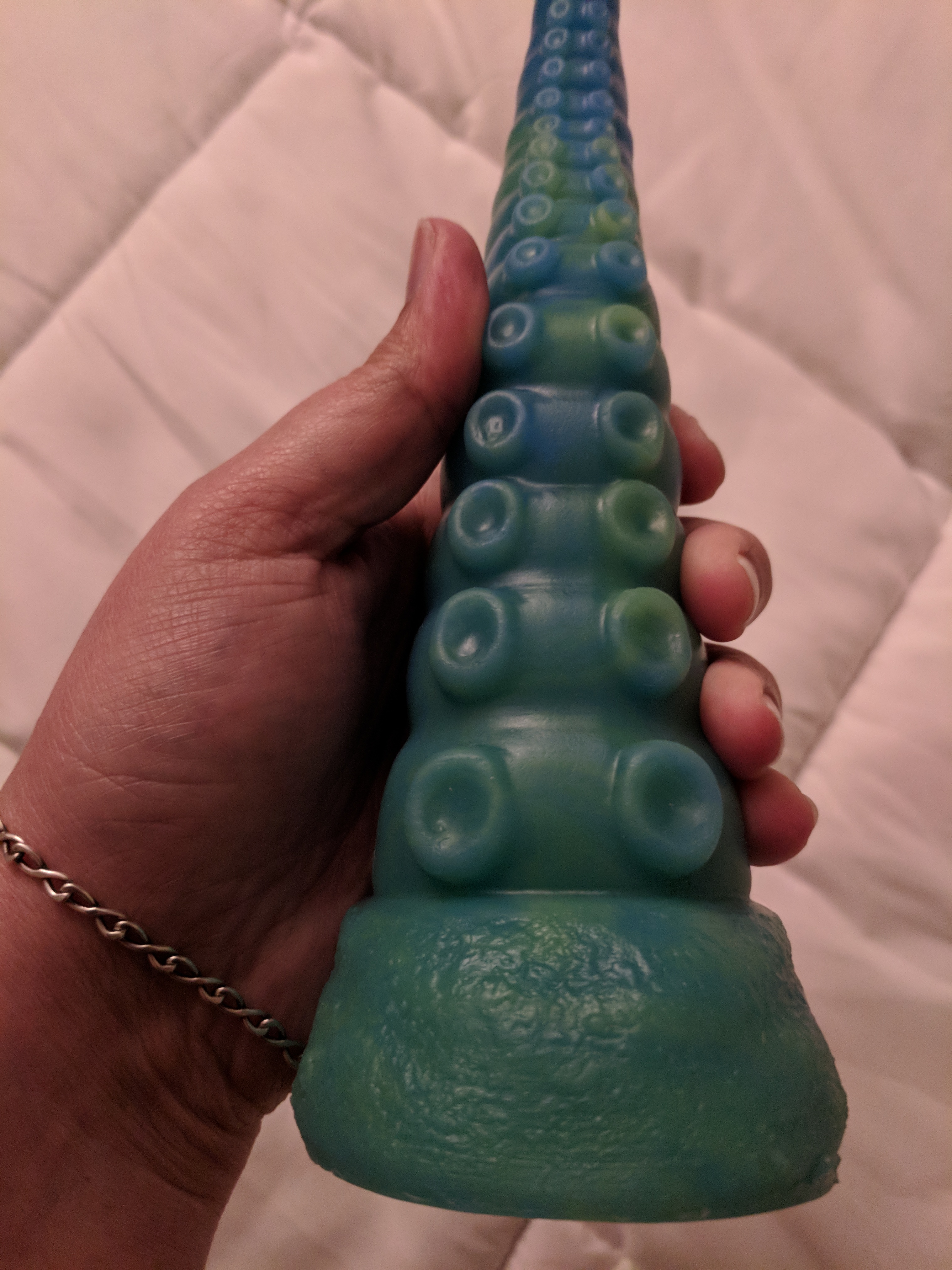 Tentacle dildo bottom third, showing the base and the width of the toy at that base