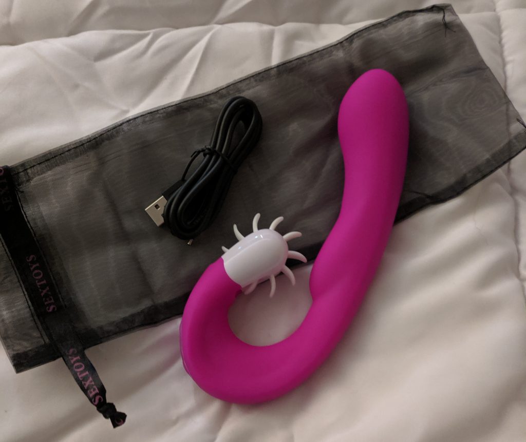 Magic Tongue vibe with storage bag and charging cable