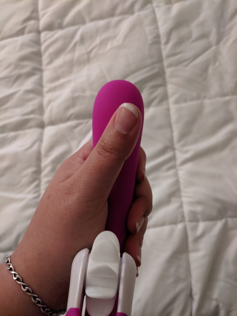 Magic Tongue vibe with thumb for size comparison. It's about a thumb and a half wide.