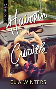 Hairpin curves cover, with two women in a car making a heart with their hands