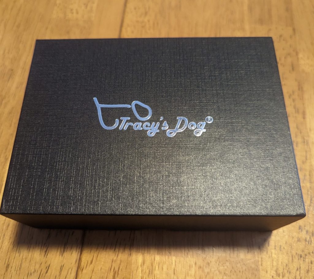 P. Cat box, a black box with the Tracy's Dog logo on the front