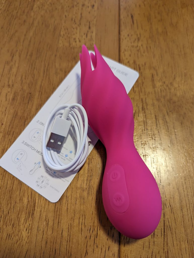 Octopus vibrator with charging cable and instruction card