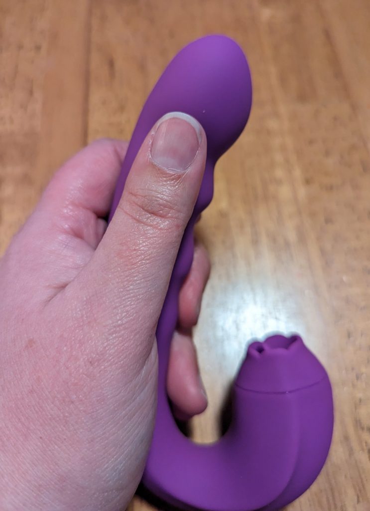 Thumb against shaft for size comparison