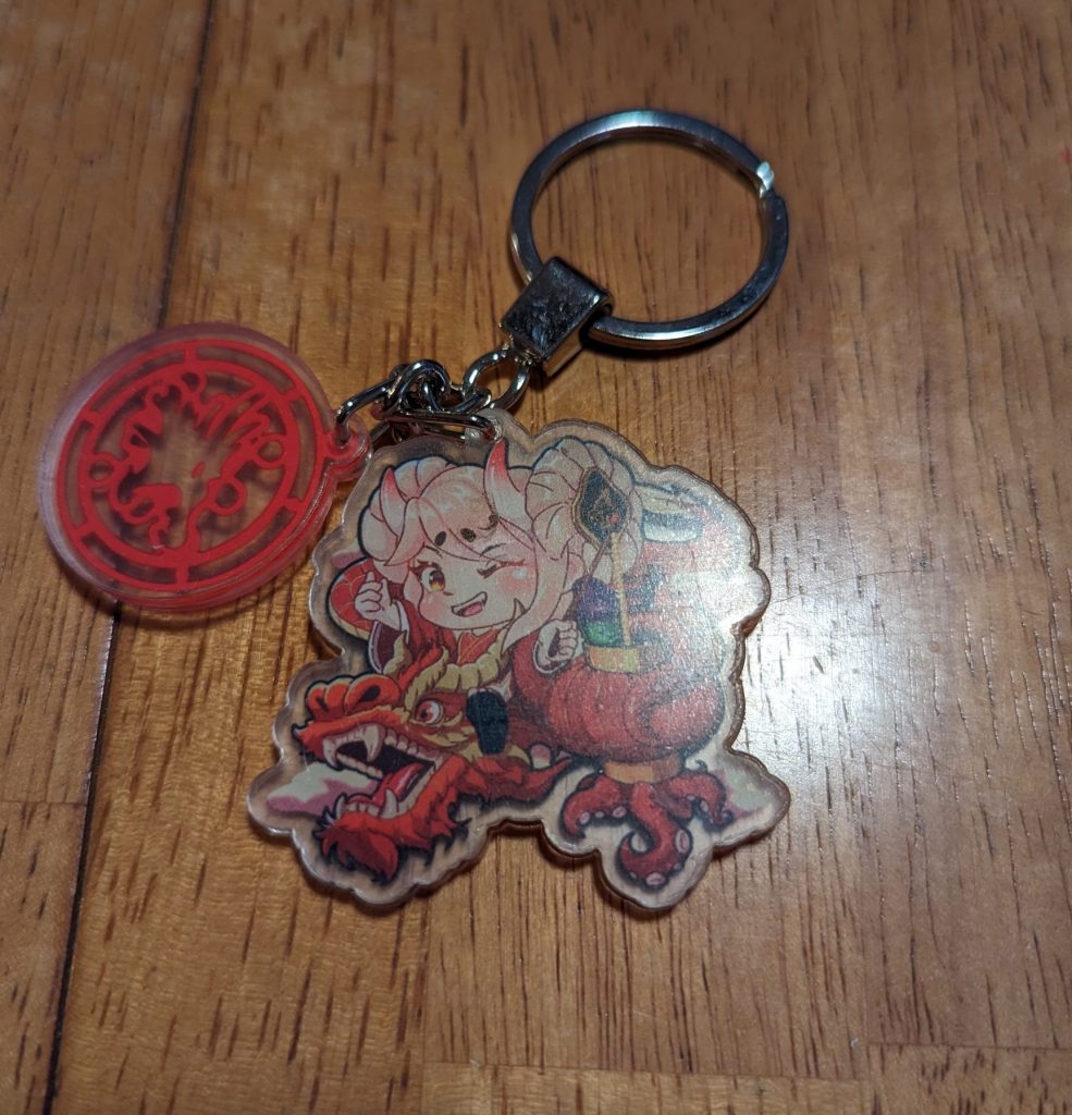 Keychain with an enthusiastic tentacle lover