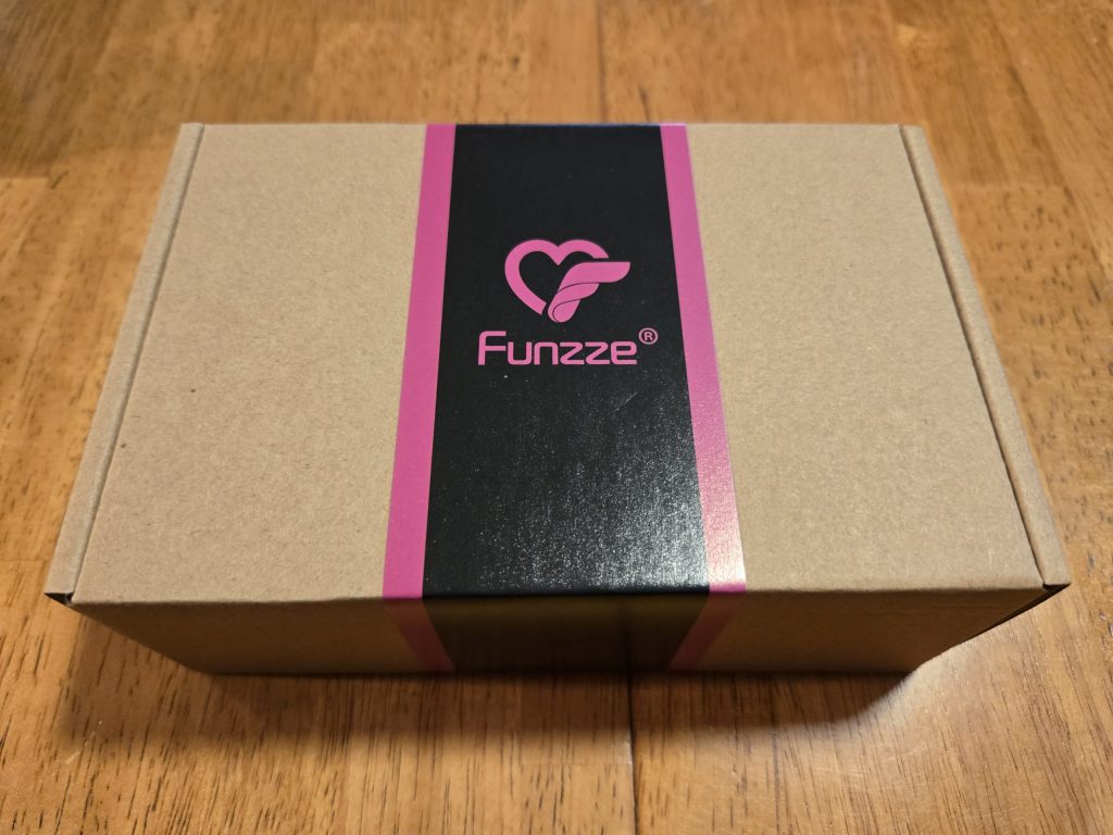 Funzze outer box, cardboard with a paper sleeve just as described
