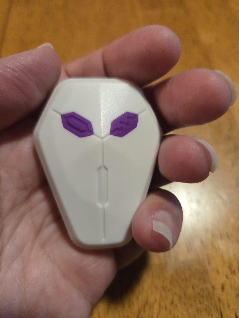 Coffin-shaped remote control with two buttons