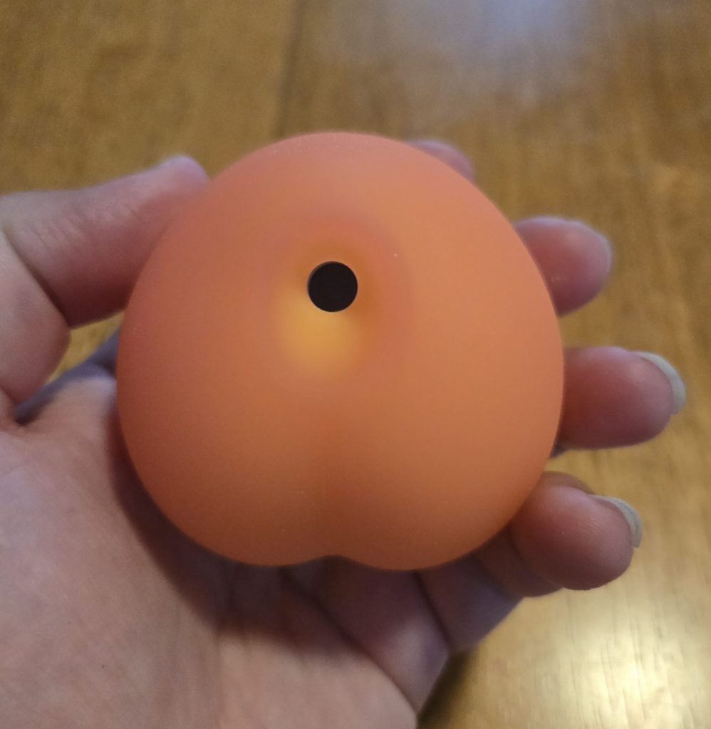 peach in hand
