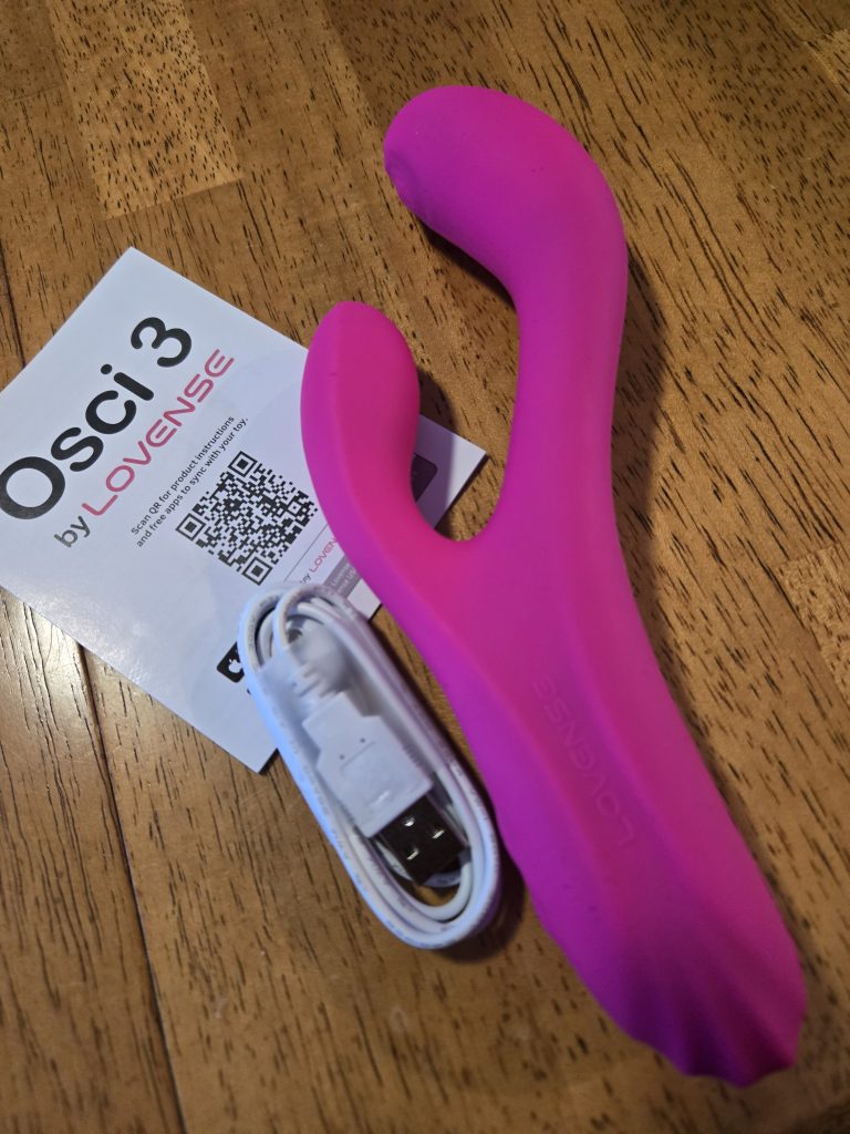 Osci 3 on table with charger